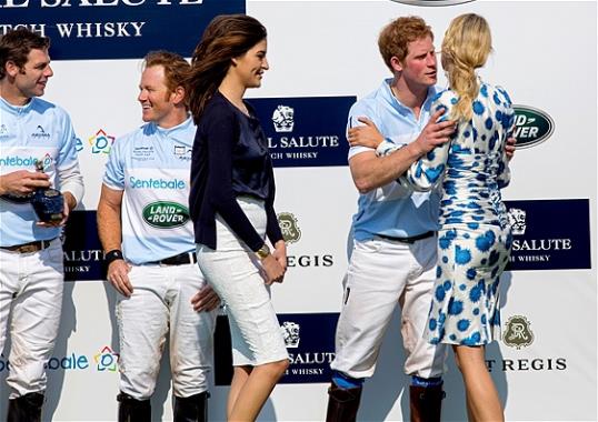 Photo: Britain's Prince Harry embraces model Karolina Kurkova after the Sentebale Royal Salute Polo Cup charity match (AP Photo/Craig Ruttle)