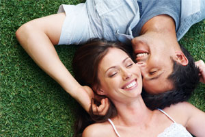 Photo: Couple in Grass // Shutterstock