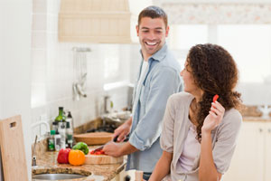Photo: Couple cooking // Thinkstock