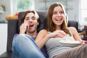 Photo: Couple watching television // Getty