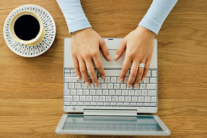 Photo: Woman typing // Getty