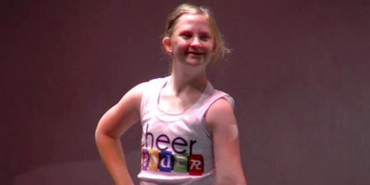 Photo: Lily Smith, 14, the first student with Down syndrome to join the Eisenhower Junior High cheerleading team (KSL TV-5, http://aka.ms/LilySmith)