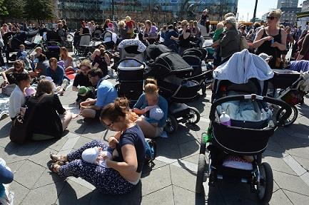 Photo: Hundreds of women feed their babies outside City Hall Square in Copenhagen, Monday June 17, 2013, in a demonstration to promote public breastfeeding after customers at a cafe told a woman suckling her baby that it was disgusting. (AP Photo/Polfoto, Mik Eskestad) 