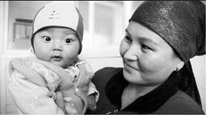 Photo: Mother & baby in Kyrgyzstan, courtesy of Save the Children