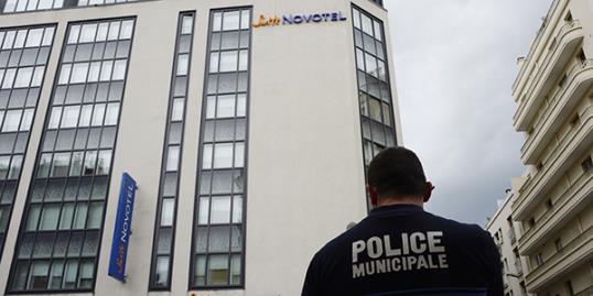 Photo: A policeman stands guard on May 17, 2013 outside the Novotel Hotel in downtown Cannes, southern France, after jewellery worth more than one million dollars made by Swiss luxury watchmaker and jeweller Chopard were stolen at the hotel during the 66th edition of the Cannes Film Festival in Cannes.ANNE-CHRISTINE POUJOULAT/AFP/Getty Images
