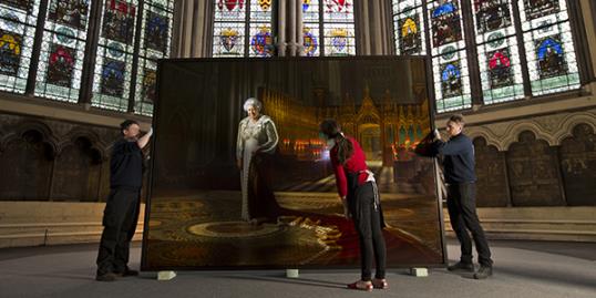 File photo of a portrait of Queen Elizabeth II before it is positioned inside the Chapter House at Westminster Abbey on May 17, 2013 in London, England. A man has been accused of defacing the royal painting. (Photo by Dan Kitwood/Getty Images)