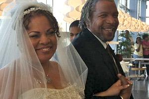 Photo: Julie Rodgers and Willie Pittman just after being pronounced husband and wife inside IKEA in College Park. (WTOP/Michelle Basch)