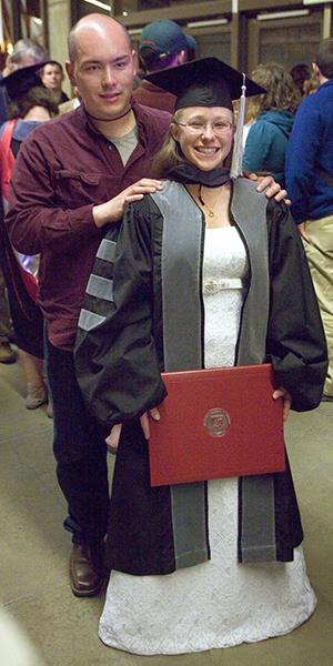 Photo: Casaundra Dotts Ho, right, and her husband Ben on Saturday, May 4, 2013 after Casaundra Dotts Ho graduated in the Washington State University College of Veterinary Medicine commencement ceremony in Pullman, WA. (Dean Hare/Moscow-Pullman Daily News/AP) 