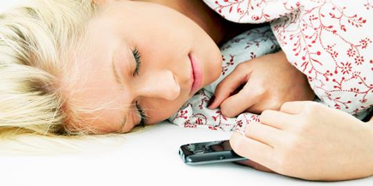 Sleep texting / Michael Bodmann/Getty Images 