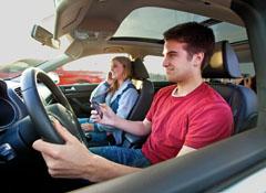 Texting, not wearing a safety belt, and one-hand steering increase driving risks. Photo courtesy of Consumer Reports.