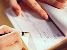 Image: Checkbook (© Royalty-Free/Corbis/Corbis)