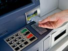 Image: Cash machine (© Compassionate Eye Foundation/Getty Images/Getty Images)