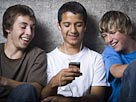 Image: Teens with MP3 player (© RubberBall/SuperStock)