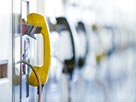 Row of pay phones. Credit: ©Nikada/Vetta/Getty Images