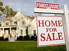 Image: Home with foreclosure sign in front yard © Ariel Skelley/Stockbyte/Getty Images