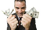 Image: CEO holding cash (© Rubberball/Getty Images)