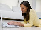 Image: Woman with laptop (© Mike Watson Images/Corbis)