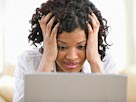 Image: Woman with computer (© Jose Luis Pelaez/Getty Images/Getty Images)