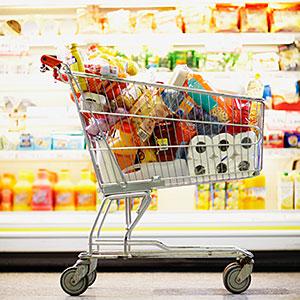 Image: Full Shopping Cart in Grocery Store© Fuse/Getty Images