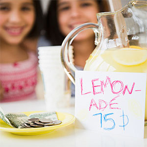 Children with lemonade stand © Jamie Grill, Tetra images, Getty Images