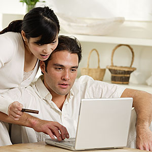 Image: Couple Making Online Purchase © Fuse, Getty Images