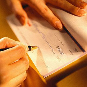 Image: Checkbook (© Royalty-Free/Corbis/Corbis)