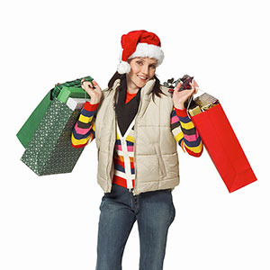 Image: Woman with Santa hat (© Stockdisc/SuperStock)