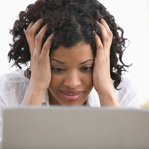 Image: Woman with computer (© Jose Luis Pelaez/Getty Images/Getty Images)