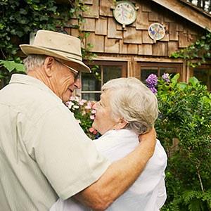 Senior Couple in a Garden (© Corbis)