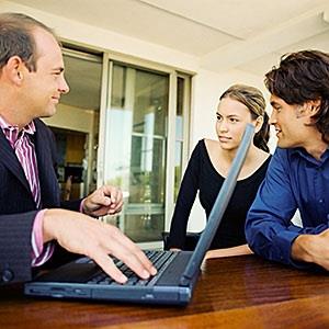 Couple meeting financial adviser © Image Source, Getty Images