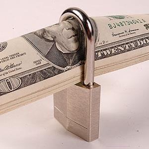Image: Money with lock © Ingram Publishing, SuperStock