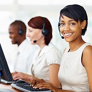 Image: Young business woman with her colleagues working in call center © Daniel Laflor/the Agency Collection/Getty Images