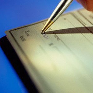 Image: Checkbook (© Corbis)