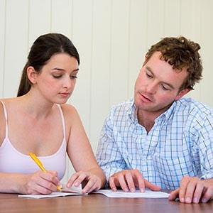Image: Couple with paperwork © IT Stock Free, Jupiterimages
