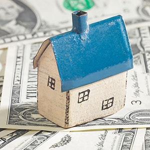 Image: House with bills (© Ingram Publishing/SuperStock)