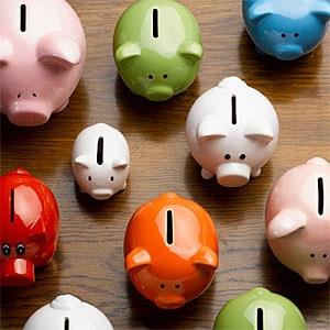 Multi-colored ceramic piggy banks © Andy Roberts, OJO Images, Getty Images