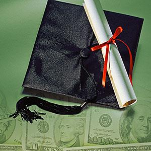 Mortarboard , diploma and money © Comstock, Getty Images