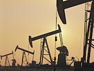 Image: Oil derricks (© Comstock/Corbis)