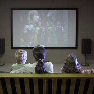 Watching television, copyright Frare, Davis Photography, Brand X, Corbis