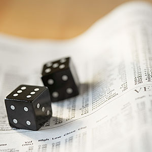  Dice on stock listings copyright Kate Kunz, Corbis