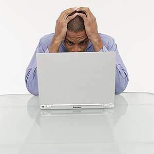 Image, Man with laptop copyright Comstock Images, Jupiterimages
