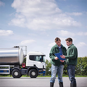 Workers reading clipboard by tanker copyright Monty Rakusen, Cultura, Getty Images