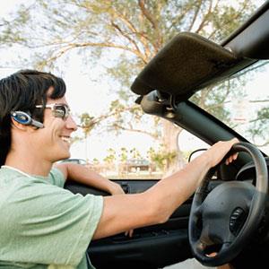 Man using hands-free phone copyright Digital Vision Ltd, Getty Images