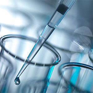 Droplet Falling from Pipette into Test Tube copyright Andrew Douglas, Radius Images, Getty Images