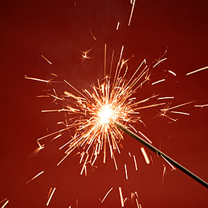 Close-up of a burning sparkler copyright IMAGEMORE Co., Ltd., Imagemore, Getty Images