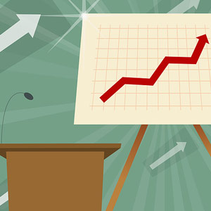 Microphone on a lectern with a line graph Image Source Photolibrary