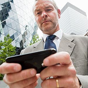 Businessman using smartphone Image Source Image Source Getty Images
