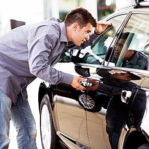 A young man admiring a new car copyright i love images, Cultura, Getty Images