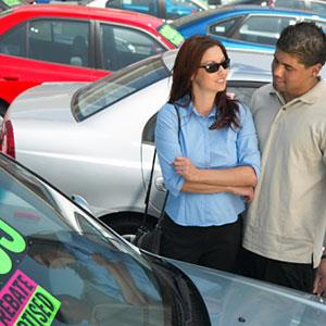 Couple shopping for car copyright Medio Images, Getty Images