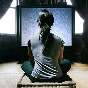 Watching television copyright Digital Vision Ltd. SuperStock